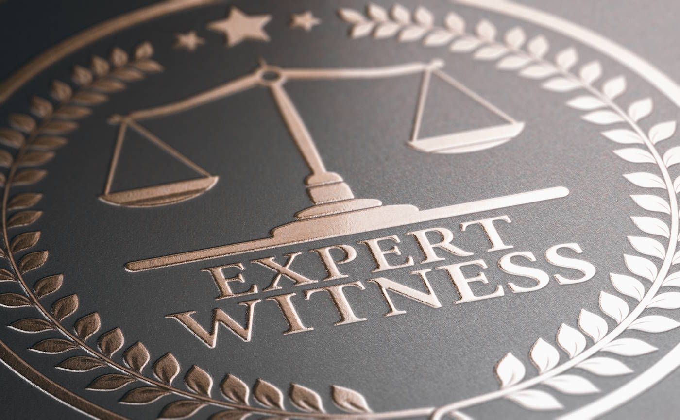 Expert Witness plaque with the scales of justice